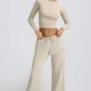 Pantaloni de jogging cu talie joasă și picior larg, în culoarea Bone