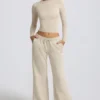 Pantaloni de jogging cu talie joasă și picior larg, în culoarea Bone