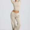 Pantaloni de jogging cu talie joasă și picior larg, în culoarea Bone