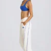 Pantaloni de jogging cu talie medie și croi drept, în culoare albă Pantaloni de jogging cu talie medie și croi drept, în culoare albă