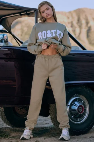 Pantaloni de jogging din fleece de bumbac cu talie medie, în culoarea verde kaki Pantaloni de jogging din fleece de bumbac cu talie medie, în culoarea verde kaki