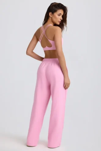 Pantaloni de jogging din jersey de bumbac moale, cu talie medie și croi larg, în roz pal Pantaloni de jogging din jersey de bumbac moale, cu talie medie și croi larg, în roz pal
