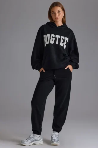 Pantaloni de jogging din jersey de bumbac moale, cu talie medie, în negru Pantaloni de jogging din jersey de bumbac moale, cu talie medie, în negru