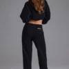 Pantaloni de jogging din jersey de bumbac moale, cu talie medie, în negru Pantaloni de jogging din jersey de bumbac moale, cu talie medie, în negru