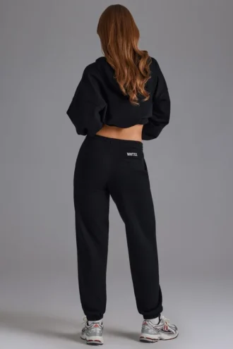 Pantaloni de jogging din jersey de bumbac moale, cu talie medie, în negru Pantaloni de jogging din jersey de bumbac moale, cu talie medie, în negru