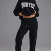 Pantaloni de jogging din jersey de bumbac moale, cu talie medie, în negru Pantaloni de jogging din jersey de bumbac moale, cu talie medie, în negru