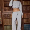 Pantaloni de jogging din jersey periat, cu croi larg, în culoarea gri melanj Pantaloni de jogging din jersey periat, cu croi larg, în culoarea gri melanj