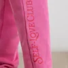 Pantaloni de jogging oversized din jersey periat, roz intens