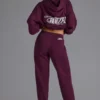 Pantaloni de jogging relaxați, cu talie medie, din jersey de bumbac moale, în culoarea strugure Pantaloni de jogging relaxați, cu talie medie, din jersey de bumbac moale, în culoarea strugure