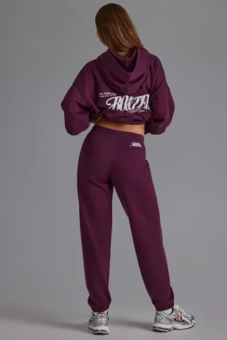 Pantaloni de jogging relaxați, cu talie medie, din jersey de bumbac moale, în culoarea strugure Pantaloni de jogging relaxați, cu talie medie, din jersey de bumbac moale, în culoarea strugure