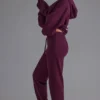 Pantaloni de jogging relaxați, cu talie medie, din jersey de bumbac moale, în culoarea strugure Pantaloni de jogging relaxați, cu talie medie, din jersey de bumbac moale, în culoarea strugure
