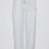 Pantaloni de jogging relaxați, cu talie medie, din jersey de bumbac periat, în gri melanj Pantaloni de jogging relaxați, cu talie medie, din jersey de bumbac periat, în gri melanj