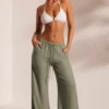 Pantaloni de plajă cu textură șifonată, de culoare verde deschis, pentru ținute de vacanță