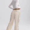 Pantaloni de trening cu croi larg, hidrofugi, în nuanța Marble Pantaloni de trening cu croi larg, hidrofugi, în nuanța Marble
