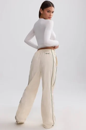 Pantaloni de trening cu croi larg, hidrofugi, în nuanța Marble Pantaloni de trening cu croi larg, hidrofugi, în nuanța Marble