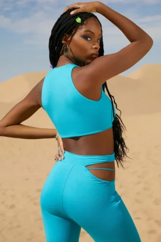 Pantaloni evazați cu decupaje Valerie Petite, culoare aqua