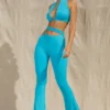 Pantaloni evazați cu decupaje Valerie Petite, culoare aqua Pantaloni evazați cu decupaje Valerie Petite, culoare aqua