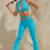 Pantaloni evazați cu decupaje Valerie Petite, culoare aqua Pantaloni evazați cu decupaje Valerie Petite, culoare aqua