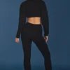 Pantaloni evazați cu pliu, din bumbac tricotat cu model împletit, în negru Pantaloni evazați cu pliu, din bumbac tricotat cu model împletit, în negru