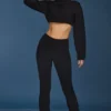 Pantaloni evazați cu pliu, din bumbac tricotat cu model împletit, în negru Pantaloni evazați cu pliu, din bumbac tricotat cu model împletit, în negru