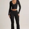 Pantaloni evazați cu pliu și nervuri din TENCEL™ Modal, negri Pantaloni evazați cu pliu și nervuri din TENCEL™ Modal, negri