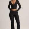 Pantaloni evazați cu pliu și nervuri din TENCEL™ Modal, negri Pantaloni evazați cu pliu și nervuri din TENCEL™ Modal, negri