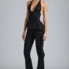 Pantaloni evazați cu talie joasă și volane metalice Reese, negri Pantaloni evazați cu talie joasă și volane metalice Reese, negri