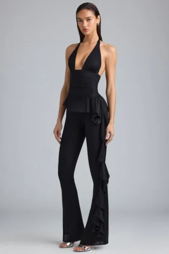 Pantaloni evazați cu talie joasă și volane metalice Reese, negri