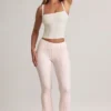 Pantaloni evazați cu talie medie și pliu Bebe Modal, cu imprimeu în dungi Pantaloni evazați cu talie medie și pliu Bebe Modal, cu imprimeu în dungi