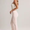 Pantaloni evazați cu talie medie și pliu Bebe Modal, cu imprimeu în dungi Pantaloni evazați cu talie medie și pliu Bebe Modal, cu imprimeu în dungi
