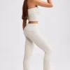 Pantaloni evazați cu talie pliată din tricot gros, culoare crem Pantaloni evazați cu talie pliată din tricot gros, culoare crem