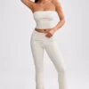 Pantaloni evazați cu talie pliată din tricot gros, culoare crem Pantaloni evazați cu talie pliată din tricot gros, culoare crem