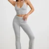 Pantaloni evazați cu tiv pliat din tricot gros, în culoarea gri melanj Pantaloni evazați cu tiv pliat din tricot gros, în culoarea gri melanj