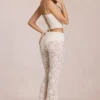 Pantaloni evazați din dantelă transparentă, cu talie medie, model Calista, culoare ivoriu Pantaloni evazați din dantelă transparentă, cu talie medie, model Calista, culoare ivoriu