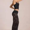 Pantaloni evazați din dantelă transparentă, cu talie medie, model Calista, negri Pantaloni evazați din dantelă transparentă, cu talie medie, model Calista, negri