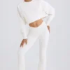 Pantaloni evazați din jersey de bumbac texturat, de culoare albă Pantaloni evazați din jersey de bumbac texturat, de culoare albă