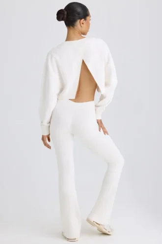 Pantaloni evazați din jersey de bumbac texturat, de culoare albă Pantaloni evazați din jersey de bumbac texturat, de culoare albă