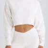 Pantaloni evazați din jersey de bumbac texturat, de culoare albă Pantaloni evazați din jersey de bumbac texturat, de culoare albă
