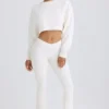 Pantaloni evazați din jersey de bumbac texturat, de culoare albă Pantaloni evazați din jersey de bumbac texturat, de culoare albă