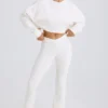 Pantaloni evazați din jersey de bumbac texturat, de culoare albă Pantaloni evazați din jersey de bumbac texturat, de culoare albă