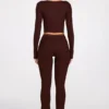 Pantaloni evazați Philippa din modal, cu talie medie, în culoarea ciocolată Pantaloni evazați Philippa din modal, cu talie medie, în culoarea ciocolată