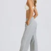 Pantaloni joggers cu talie medie și croi drept, în culoarea gri melanj Pantaloni joggers cu talie medie și croi drept, în culoarea gri melanj