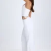 Pantaloni largi cu decupaje și curea Zaria, în culoarea alb