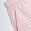 Pantaloni Piran din poplin de bumbac cu croi larg, cu dungi roz