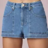 Pantaloni scurți Beata cu talie înaltă și croi în A, spălare albastru mediu Pantaloni scurți Beata cu talie înaltă și croi în A, spălare albastru mediu