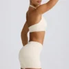 Pantaloni scurți cu volane în marl ivoriu Pantaloni scurți cu volane în marl ivoriu