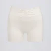 Pantaloni scurți cu volane în marl ivoriu Pantaloni scurți cu volane în marl ivoriu