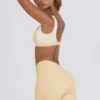 Pantaloni scurți mini cu volane în marl de culoare lămâie Pantaloni scurți mini cu volane în marl de culoare lămâie