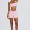 Pantaloni scurți mini cu volane în marl roz pal