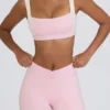 Pantaloni scurți mini cu volane în marl roz pal